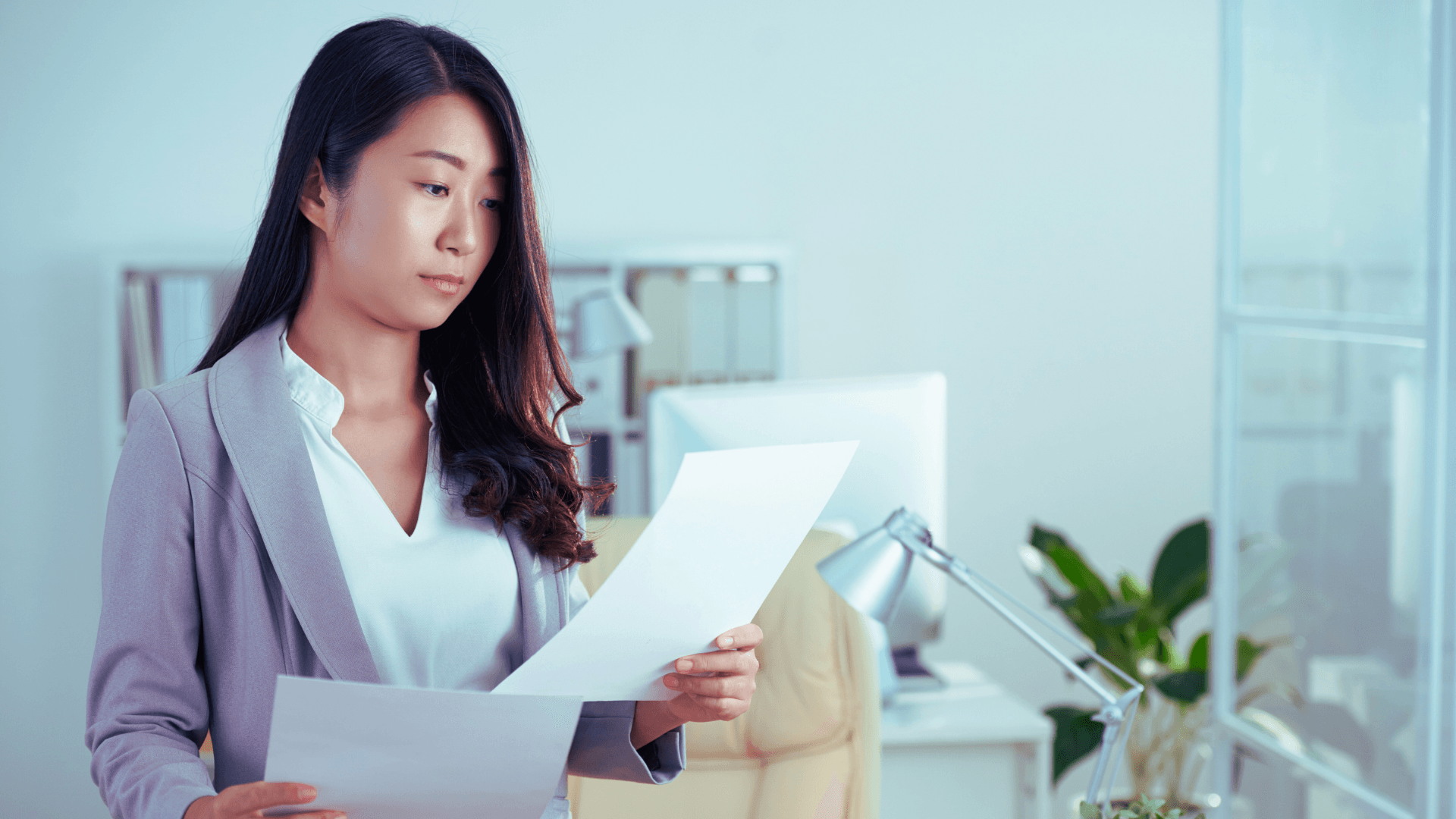 A woman looking at a document