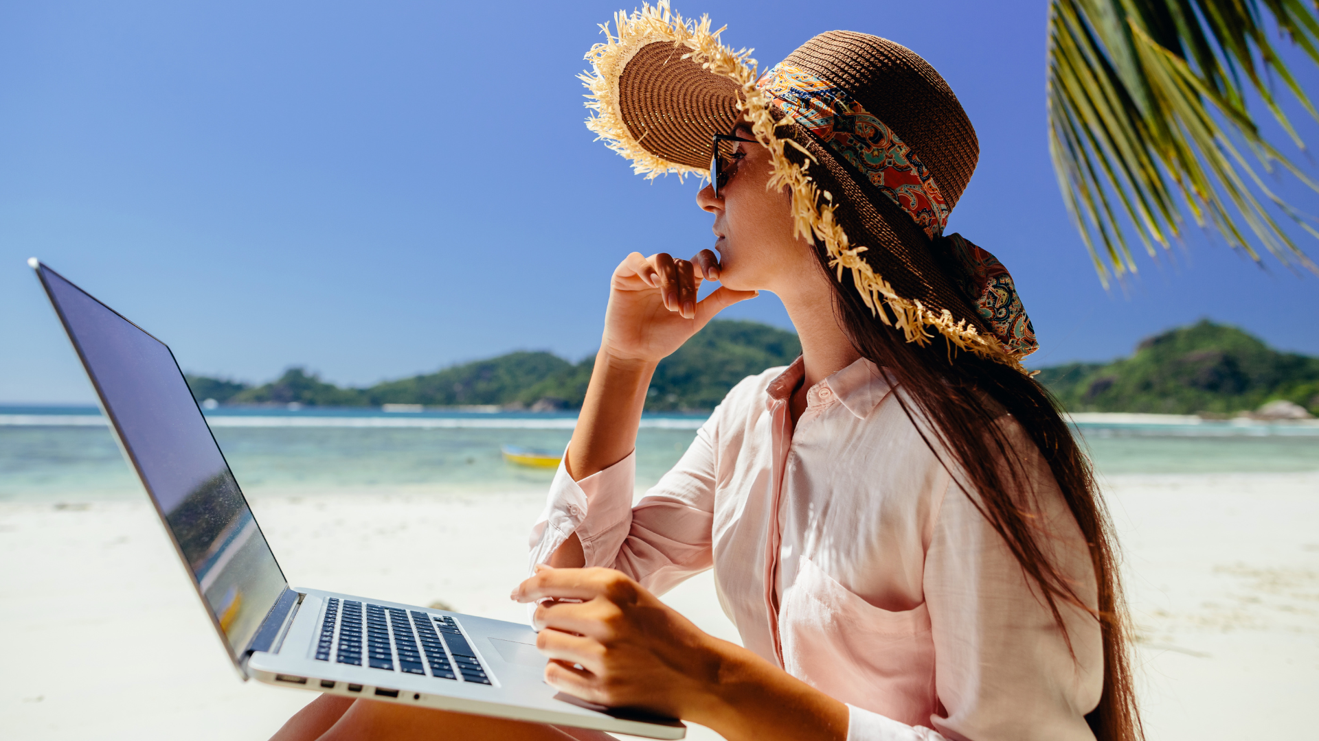 Content writer at the beach relaxing