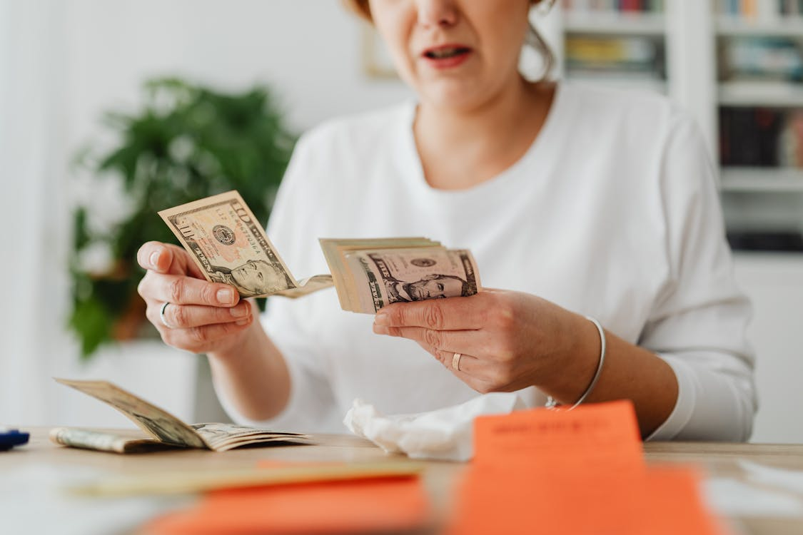 A woman counting money